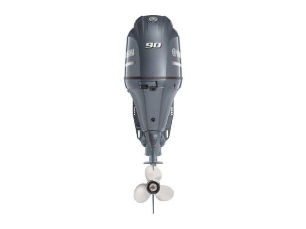 A front view of a Yamaha 90 outboard marine boat motor with a propeller attached.