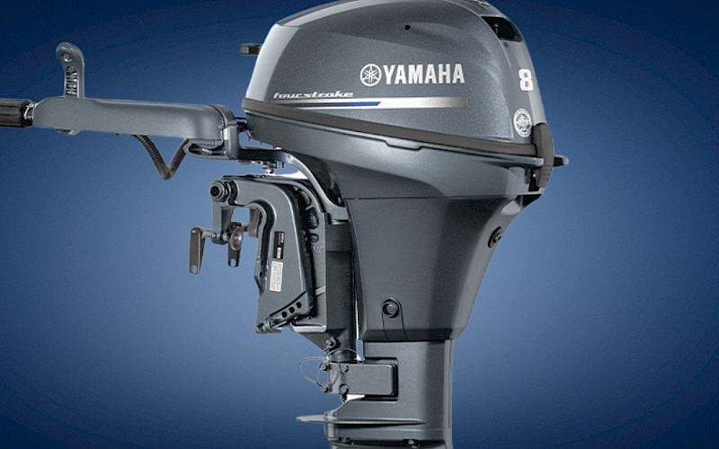 A Yamaha outboard boat motor with a propeller, gray housing and &ldquo;8&rdquo; on the cowling, shown against a blue background.